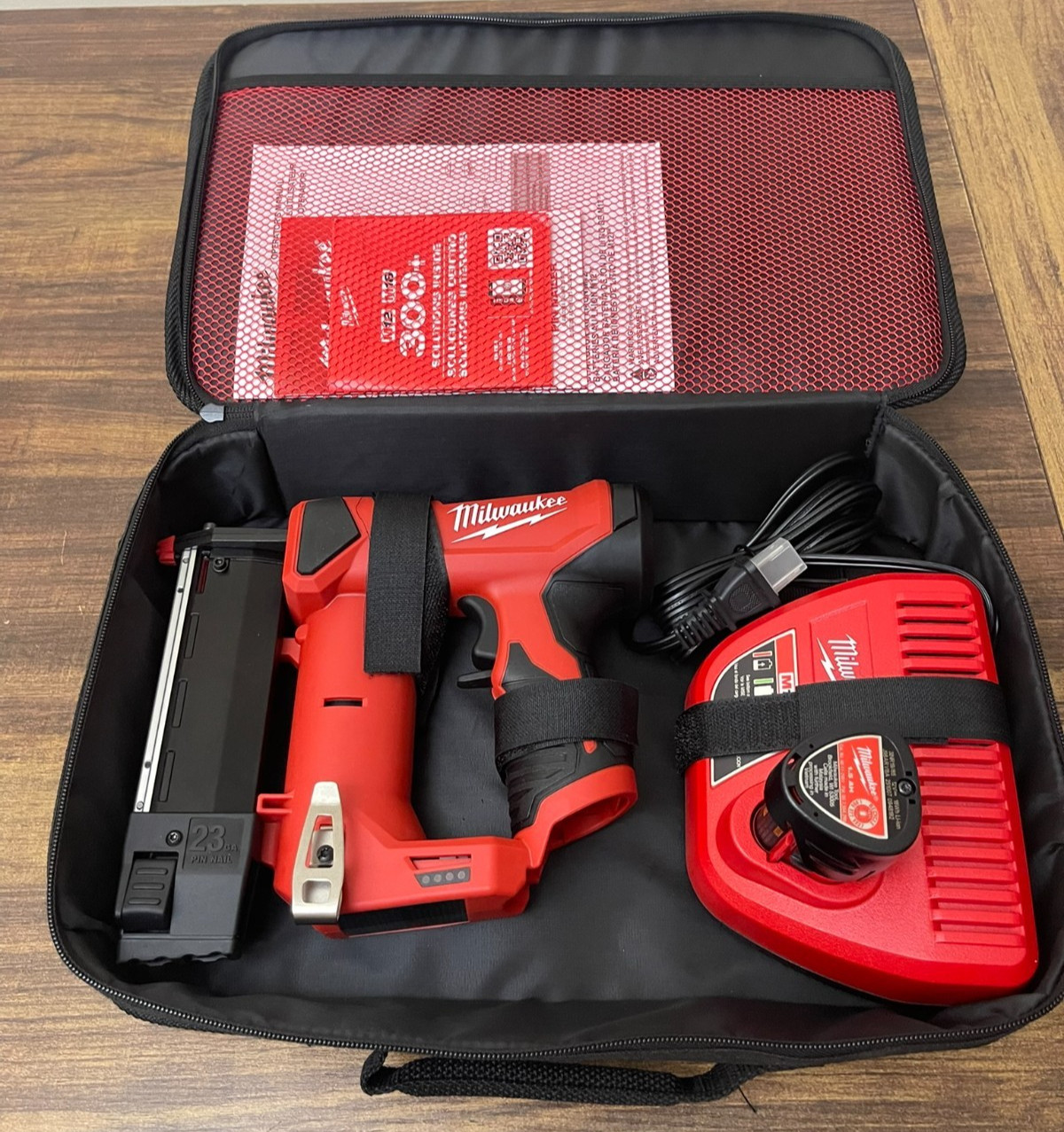 Milwaukee M12 12-Volt 23-Gauge Lithium-Ion Cordless Pin Nailer w/Batt & Char new