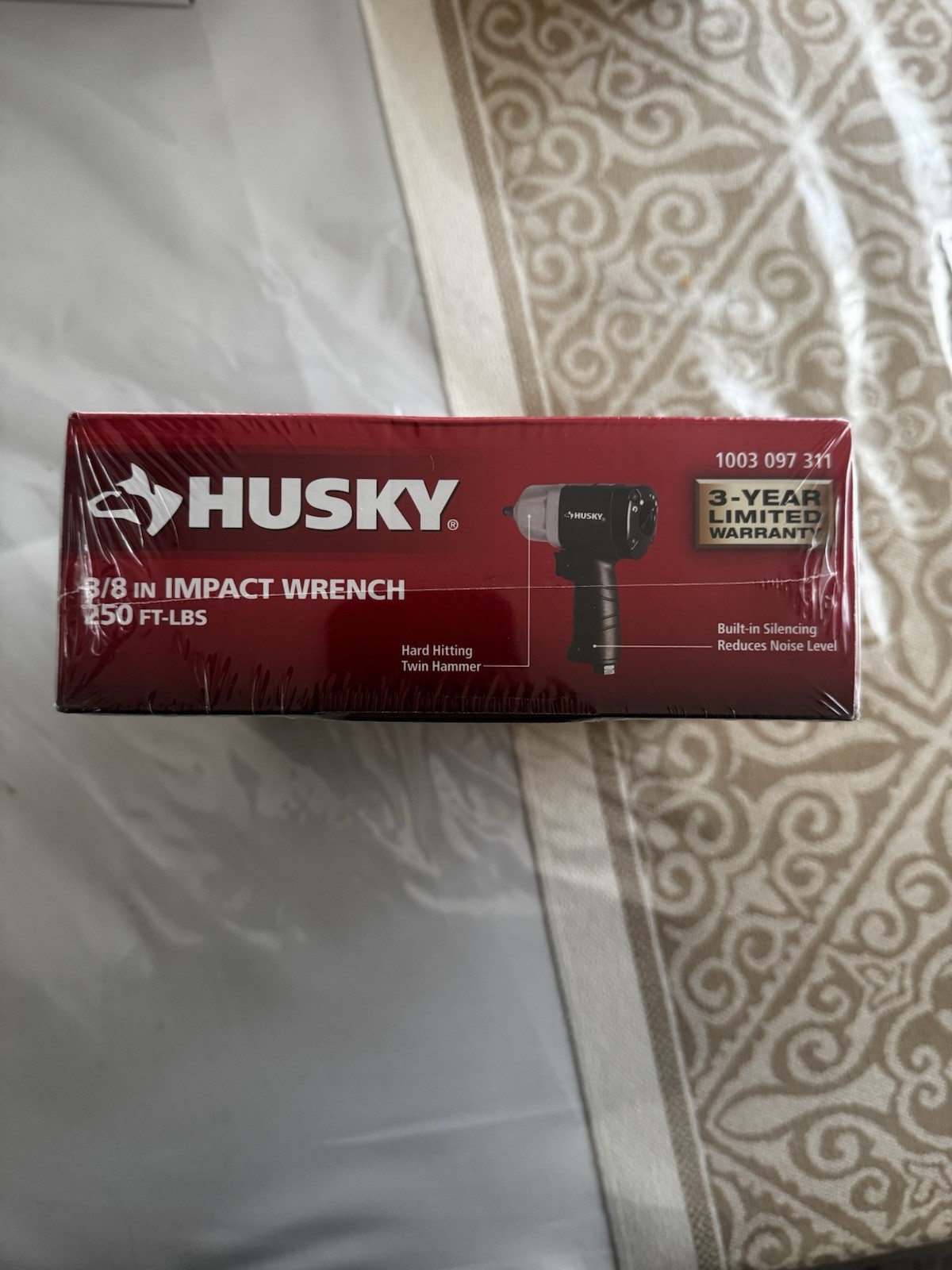 This is a Husky 250 ft./lbs. 3/8 in. Impact Wrench (Model H4425 or 1003 097 311)