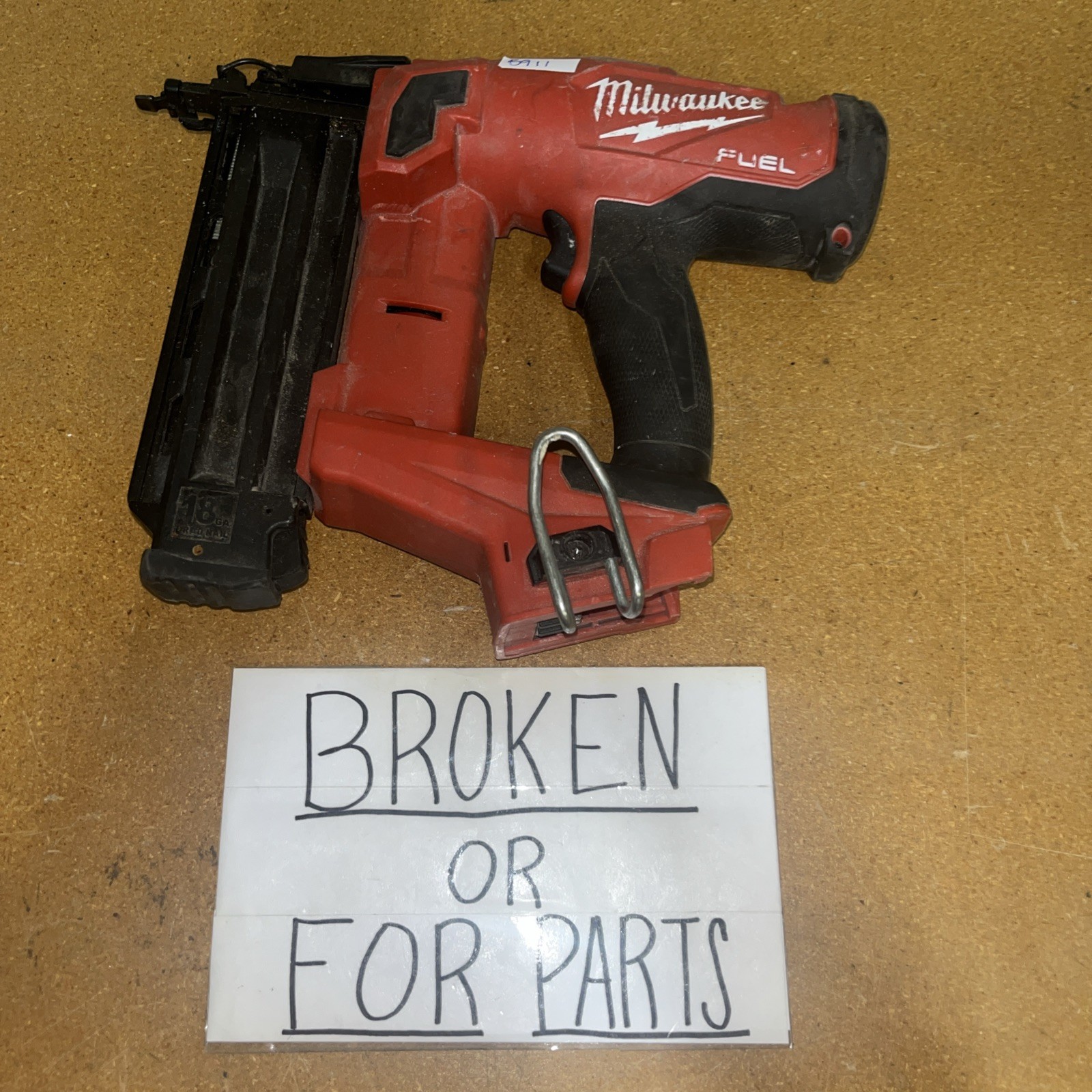 Broken Made In 2024 Milwaukee 2746-20 M18 FUEL 18V 18 Gauge Brad Nailer – 5911
