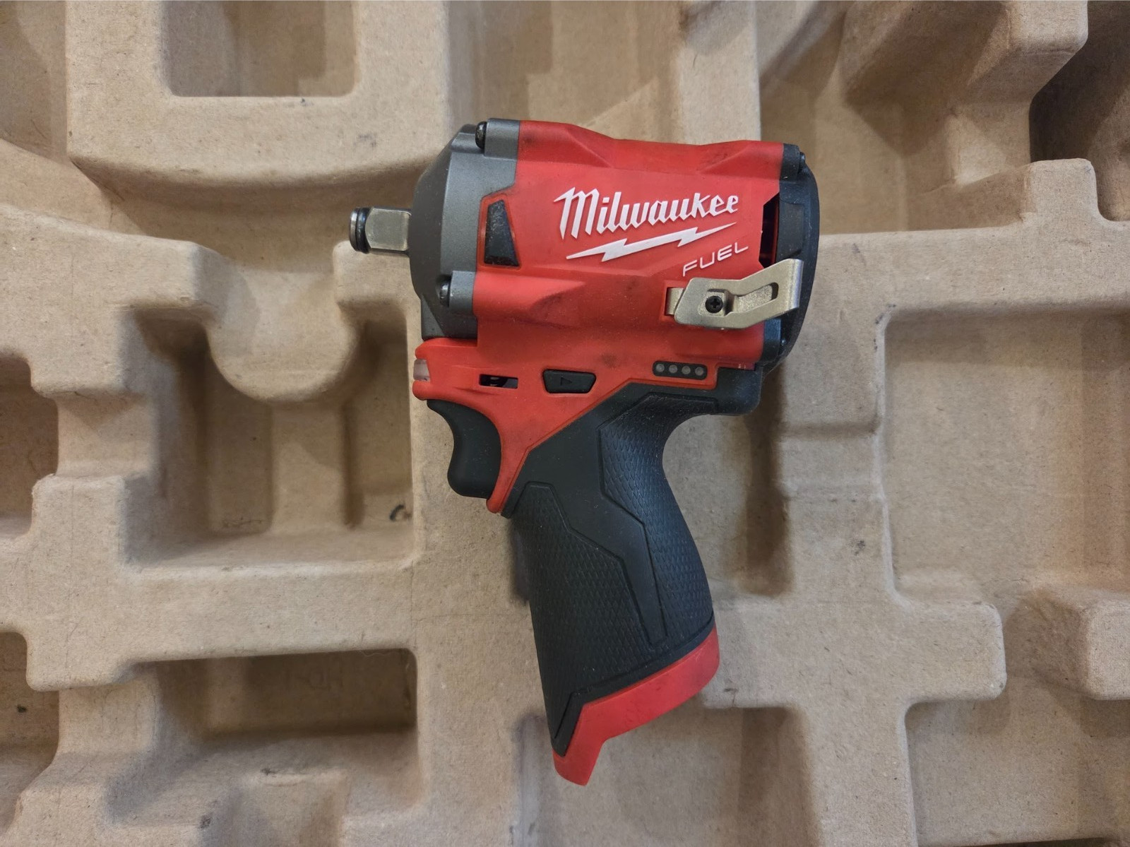 Returned A: Milwaukee 2555-20 M12 Fuel Stubby 1/2 in. Impact Wrench (108-08)