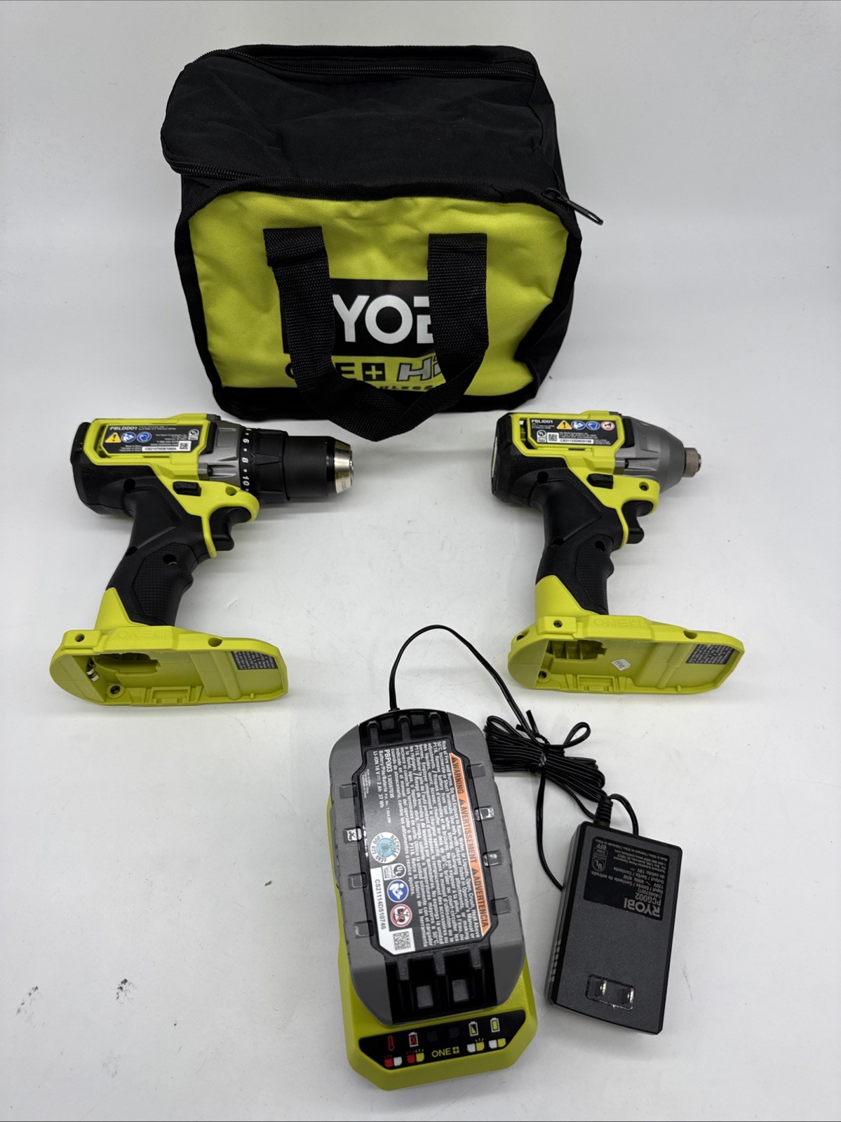 Ryobi 2Ah Battery, Charger, PBLDD01 1/2&Prime; Drill, PBLID01 Drill, PCL430 Kit – H19