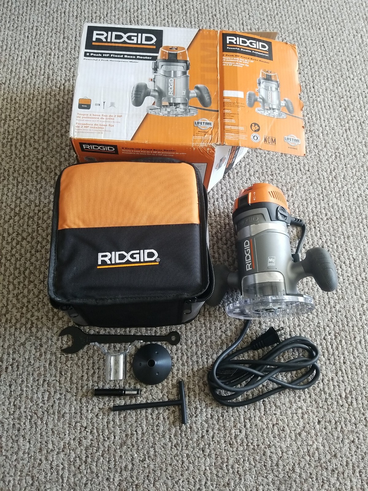 Ridgid R22002 11 Amp Corded Base Router kit.