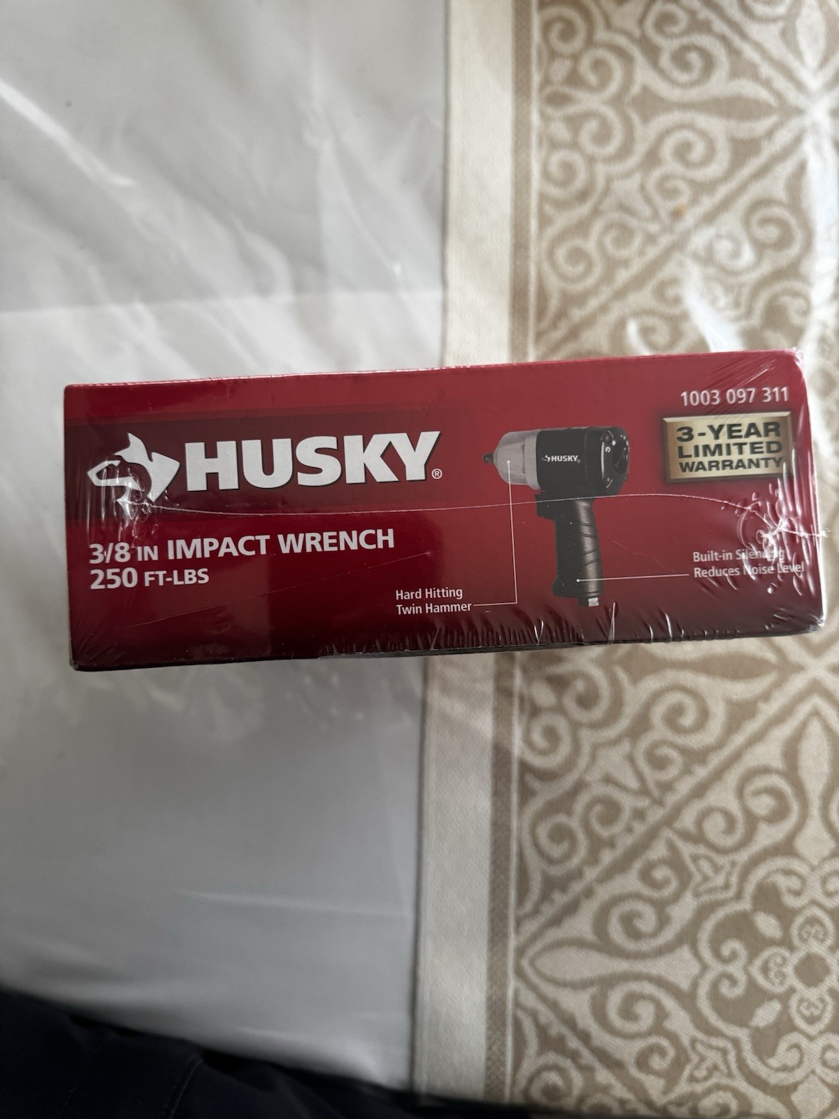 This is a Husky 250 ft./lbs. 3/8 in. Impact Wrench (Model H4425 or 1003 097 311)