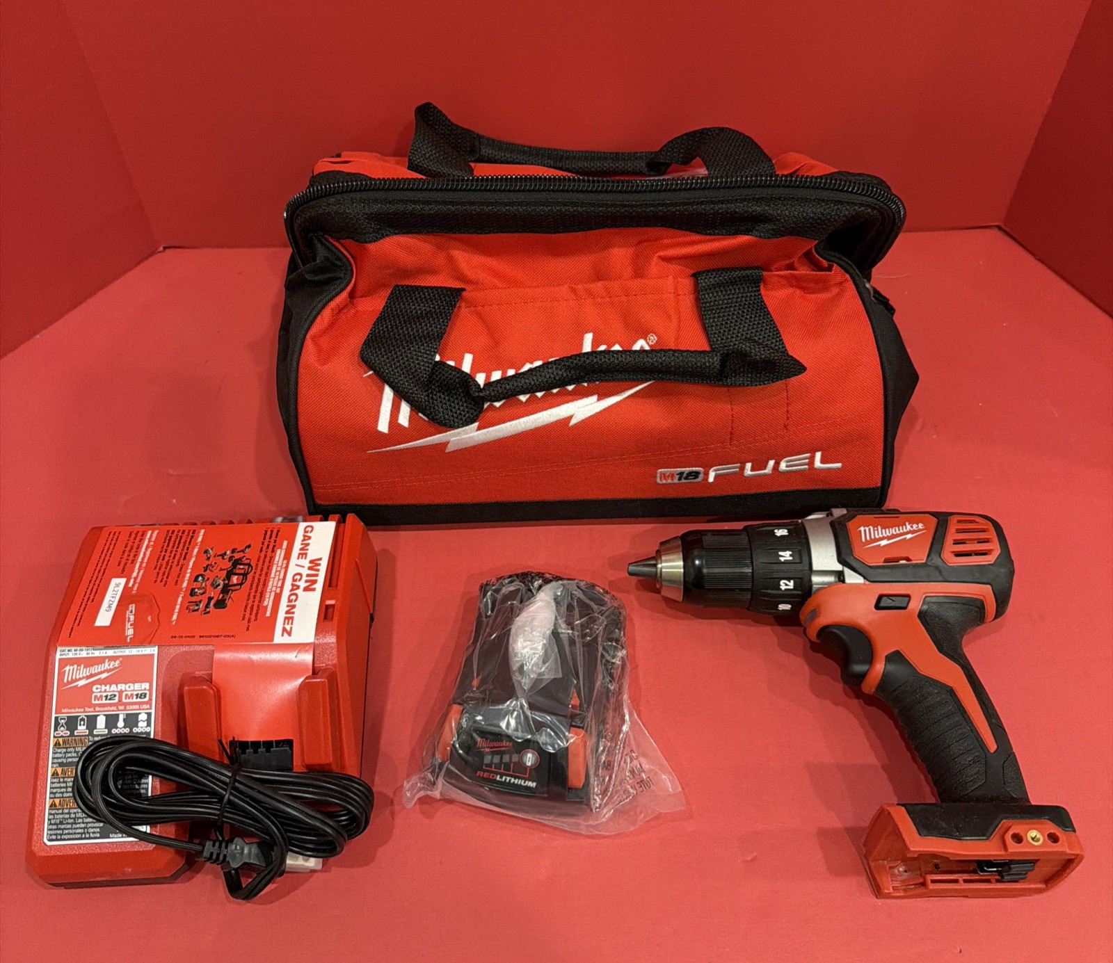 New Milwaukee 2606-20 M18 18-Volt Compact 1/2-Inch Drill Driver WITH 1.5 BATTERY