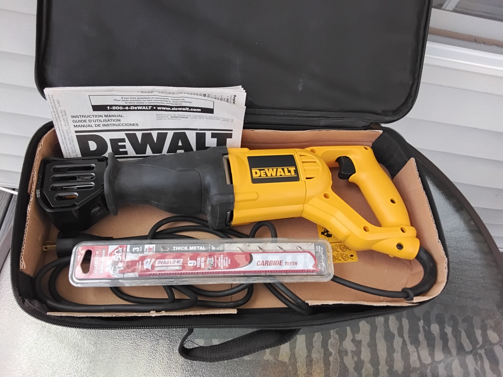 DeWalt Electric Reciprocating Saw, used, with soft case. Model DW304P & blades
